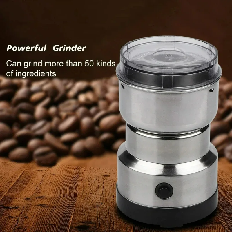 Silver electric grinder with four-blade grinding chamber and push-button control