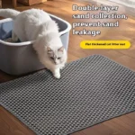 Cat litter mat photographed flat on a hard floor.